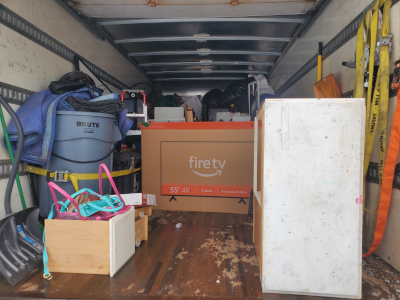 Decorative: A box truck half full of junk