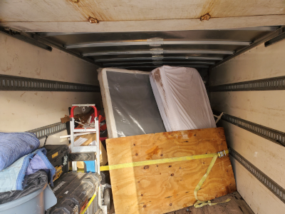 Decorative: Mattresses in the back of a box truck